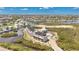 Stunning aerial view of the luxury townhomes with boat docks in a waterfront community at 2 Aqua Reserve Blvd, New Port Richey, FL 34652