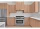 Well-equipped kitchen with stainless steel appliances, sleek cabinets, and modern countertops at 2 Aqua Reserve Blvd, New Port Richey, FL 34652