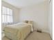 Comfortable bedroom with a large bed and soft textures creates a relaxing and inviting atmosphere for restful nights at 20312 Heritage Point Dr, Tampa, FL 33647