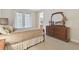 Comfortable bedroom with neutral decor and natural light at 20312 Heritage Point Dr, Tampa, FL 33647