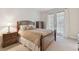 Comfortable bedroom with french doors and neutral decor at 20312 Heritage Point Dr, Tampa, FL 33647