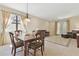 Bright dining room with wooden table and seating area at 20312 Heritage Point Dr, Tampa, FL 33647