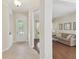 Bright living room featuring a large window, hard wood floors and a comfortable seating area at 20312 Heritage Point Dr, Tampa, FL 33647