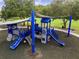 Colorful community playground with slides, climbing structures, and shaded areas at 20312 Heritage Point Dr, Tampa, FL 33647
