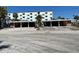 Charming low-rise beachfront property, showcasing a unique mid-century modern design and inviting curb appeal at 50 154Th Ave # 50, Madeira Beach, FL 33708