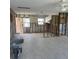 Renovations are underway to create a living room with an open floor plan that includes a kitchen at 50 154Th Ave # 50, Madeira Beach, FL 33708