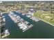 An aerial view of the marina and community amenities including the golf course, clubhouse, and pool at 5836 Skimmer Point S Blvd, Gulfport, FL 33707