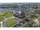 Stunning aerial showcasing the yacht club, golf course, and marina with picturesque waterfront homes at 5836 Skimmer Point S Blvd, Gulfport, FL 33707