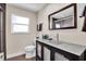 Charming bathroom features a modern vanity, updated fixtures, and a clean design for everyday convenience at 5836 Skimmer Point S Blvd, Gulfport, FL 33707