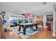 Game room featuring a pool table, arcade games, and natural light at 5836 Skimmer Point S Blvd, Gulfport, FL 33707