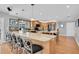 Spacious kitchen with a large island, granite countertops, stainless steel appliances, and ample cabinet space at 5836 Skimmer Point S Blvd, Gulfport, FL 33707
