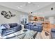 Open-concept living area flows into the kitchen, featuring a modern design at 5836 Skimmer Point S Blvd, Gulfport, FL 33707