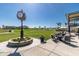 Enjoy outdoor dining and lounging with views of the golf course and marina at 5836 Skimmer Point S Blvd, Gulfport, FL 33707