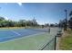Enjoy recreational sports at the community tennis courts with benches for relaxing in a landscaped setting at 5836 Skimmer Point S Blvd, Gulfport, FL 33707