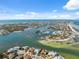 Incredible aerial view of waterfront homes, showcasing the deep water canal and bay at 727 Key Royale Dr, Holmes Beach, FL 34217
