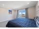 Relaxing main bedroom with a plush bed and access to a private balcony at 727 Key Royale Dr, Holmes Beach, FL 34217