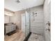 Modern tiled shower with glass enclosure and updated fixtures at 727 Key Royale Dr, Holmes Beach, FL 34217
