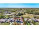 Aerial view of the property with the house highlighted and surrounding community at 8208 Rhanbuoy Rd, Spring Hill, FL 34606
