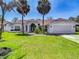 Lovely single-Gathering home with a well-kept lawn and charming landscaping at 8208 Rhanbuoy Rd, Spring Hill, FL 34606