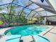 The refreshing screened pool is perfect for relaxation in the Florida sunshine at 8208 Rhanbuoy Rd, Spring Hill, FL 34606
