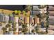 Aerial view shows neighborhood homes with pools, lawns, landscaping and mature trees at 18605 Le Dauphine Pl, Lutz, FL 33558
