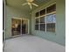 Outdoor lanai featuring windows into the main bedroom at 18605 Le Dauphine Pl, Lutz, FL 33558