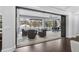 Seamless indoor-outdoor living through retractable glass doors at 242 Estado Ne Way, St Petersburg, FL 33704