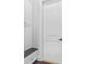 Mudroom features built-in cabinets and a bench for easy organization when entering from the garage or backyard at 242 Estado Ne Way, St Petersburg, FL 33704