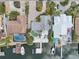 Waterfront home featuring a private dock, pool, and expansive backyard, offering ultimate relaxation and recreation at 6446 Lake Sunrise Dr, Apollo Beach, FL 33572