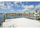Well-maintained dock with boat lift offering direct access to the water at 6446 Lake Sunrise Dr, Apollo Beach, FL 33572