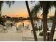 Dockside seating area offers serene water views for relaxing and entertaining at 6446 Lake Sunrise Dr, Apollo Beach, FL 33572
