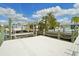 Private dock featuring a boat lift for easy access to the water and boating adventures at 6446 Lake Sunrise Dr, Apollo Beach, FL 33572