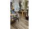Beautiful foyer with hardwood floors, decorative vases and artistic decor creates a welcoming atmosphere at 6446 Lake Sunrise Dr, Apollo Beach, FL 33572