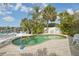 Enjoy the Florida sunshine in this inviting pool area, perfect for relaxation and outdoor fun at 6446 Lake Sunrise Dr, Apollo Beach, FL 33572