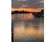 Sunset view of the waterfront and harbor at 6446 Lake Sunrise Dr, Apollo Beach, FL 33572