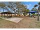 Community playground featuring a covered picnic area, slides, and play equipment at 10608 Hatteras Dr, Tampa, FL 33615