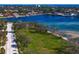Panoramic view of a waterfront community with homes, green spaces and road at 1200 N Shore Ne Dr # 204, St Petersburg, FL 33701