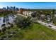 Elevated view of a parking lot, green space, and a street, with a beautiful city skyline at 1200 N Shore Ne Dr # 204, St Petersburg, FL 33701