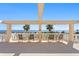 Spacious balcony with chairs and scenic ocean views at 1200 N Shore Ne Dr # 204, St Petersburg, FL 33701
