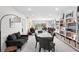 Open-concept living room and dining area with ample space, modern decor, and natural light at 1200 N Shore Ne Dr # 204, St Petersburg, FL 33701