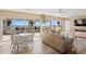 Spacious living room with a balcony and serene ocean views at 1200 N Shore Ne Dr # 204, St Petersburg, FL 33701
