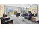 Bright living room with large windows, comfortable seating, and stylish decor at 1200 N Shore Ne Dr # 204, St Petersburg, FL 33701