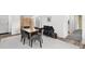 Well-lit living and dining space featuring comfortable furnishings and modern decor at 1200 N Shore Ne Dr # 204, St Petersburg, FL 33701
