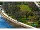 Scenic view of a waterfront walking path with lush greenery at 1200 N Shore Ne Dr # 204, St Petersburg, FL 33701