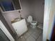 Small bathroom with a toilet, vanity, and mirror at 2120 57Th N Ave, St Petersburg, FL 33714