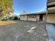 Side view of a single-story home with a carport and well-maintained lawn at 2120 57Th N Ave, St Petersburg, FL 33714