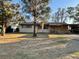 Single story home, featuring a covered carport and a green front yard at 2120 57Th N Ave, St Petersburg, FL 33714
