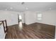 Bright bonus room featuring wood flooring, recessed lighting, and access to other areas of the home at 4446 Wildstar Cir, Wesley Chapel, FL 33544