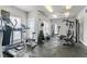 Well-equipped fitness center with various machines, weights, and natural light at 1216 S Missouri Ave # 224, Clearwater, FL 33756