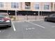 Exterior shot showing convenient parking near the building with designated parking spots at 1216 S Missouri Ave # 224, Clearwater, FL 33756